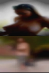 Naked woman driving bike